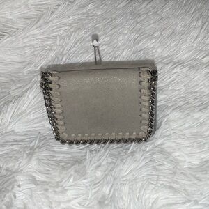 Stella McCarthy Gray and Black Wallet with Chain Detail.